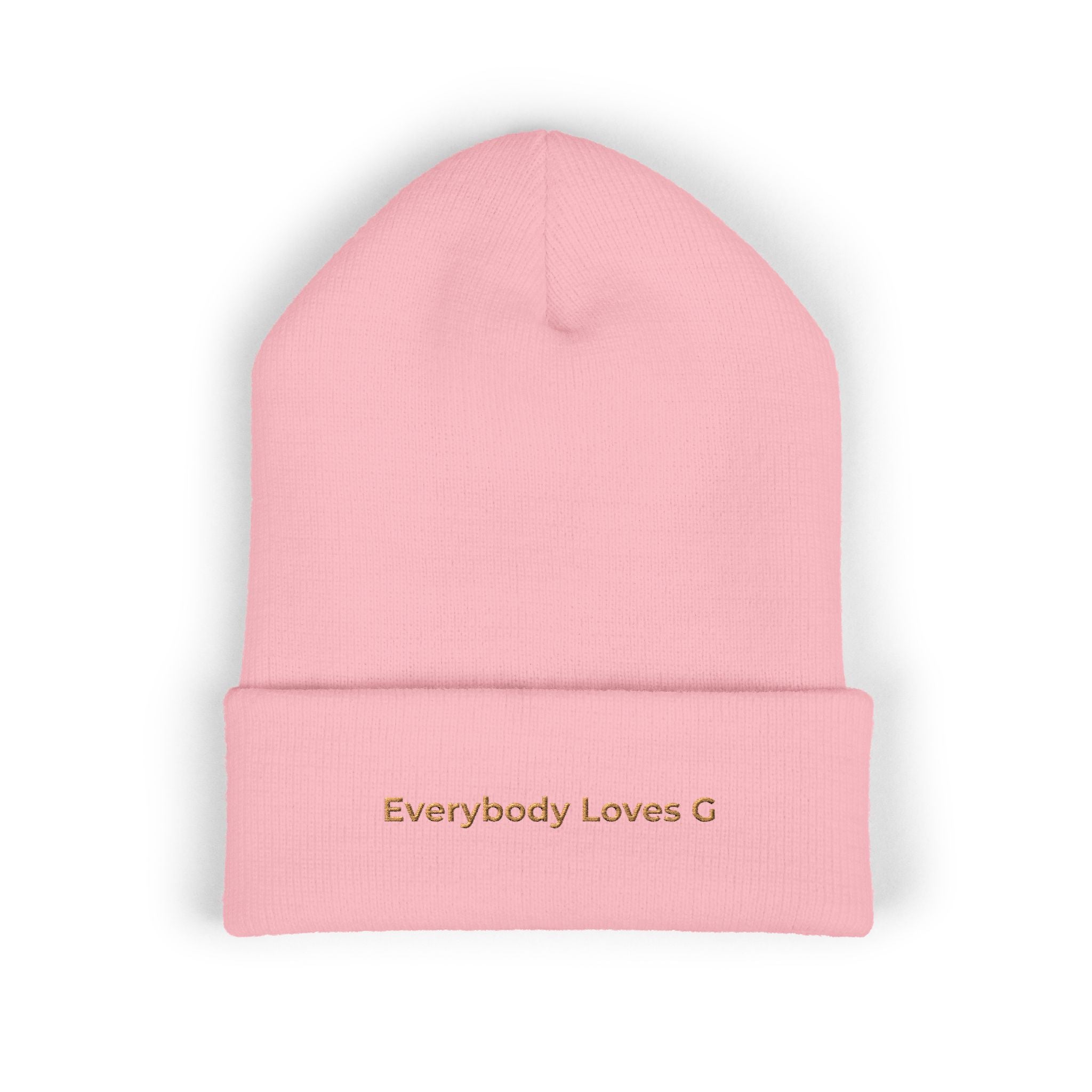 Pink beanie with 'Everybody Loves G' text on a white background