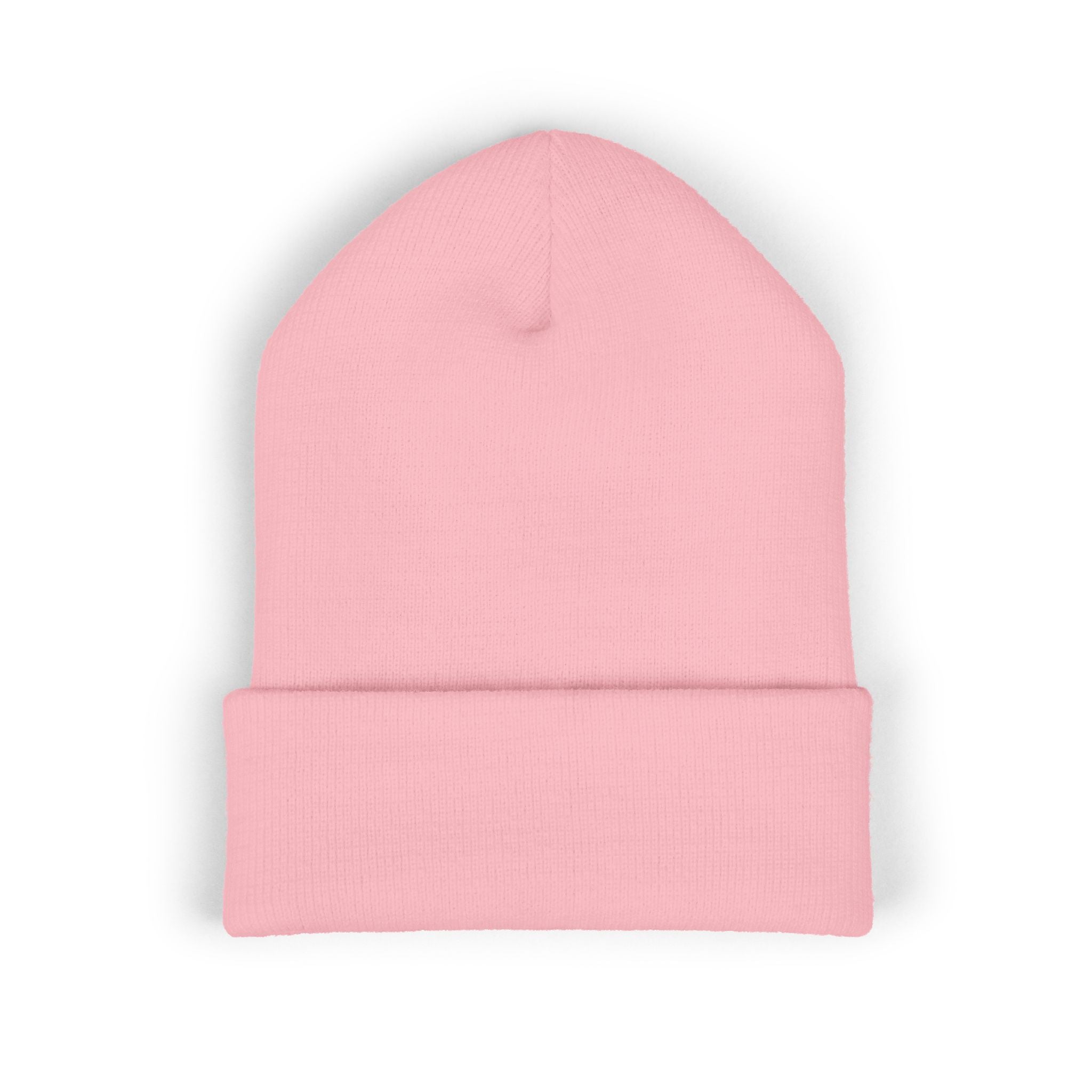 Pink beanie hat on a white background