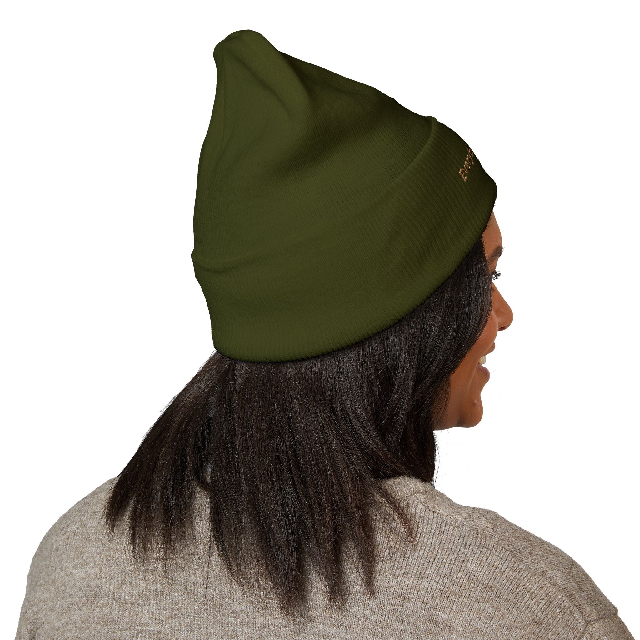 Model wearing olive green Everybody Loves G beanie viewed from side profile on white background